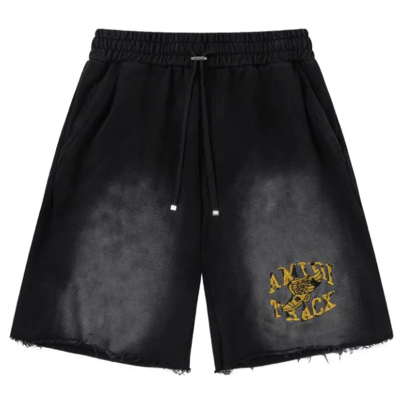 AMIRI logo-embellished cotton track Shorts