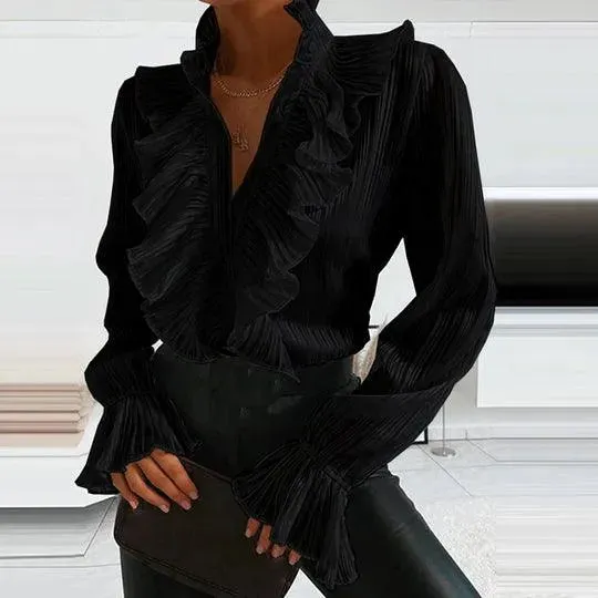 Hannie - Blouse with ruffles and long sleeves.