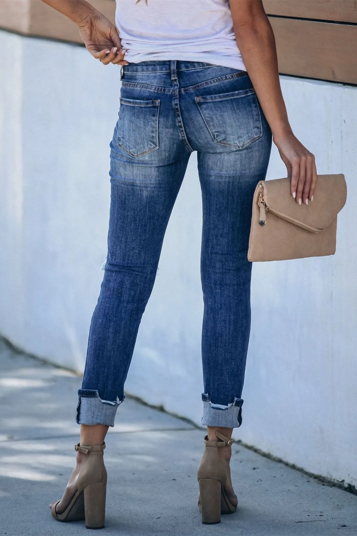 Universal Mid Rise Distressed Skinny - Dark Wash